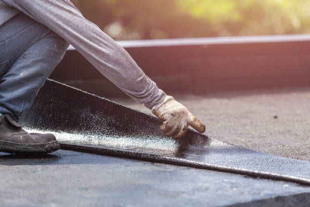 Professional Basement Waterproofing technician working in Pioneer, OH